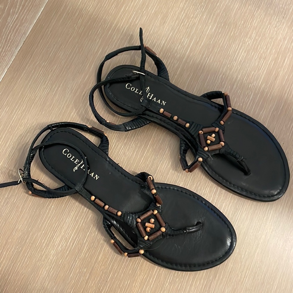 Cole Haan black leather sandals with wooden appliqués